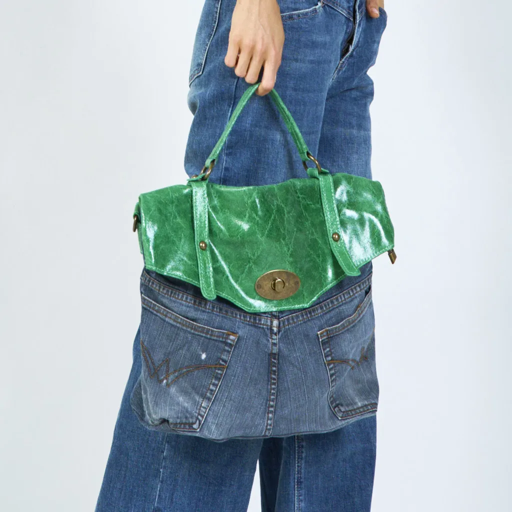 Denim and distressed leather handbags with brass hardware wholesale